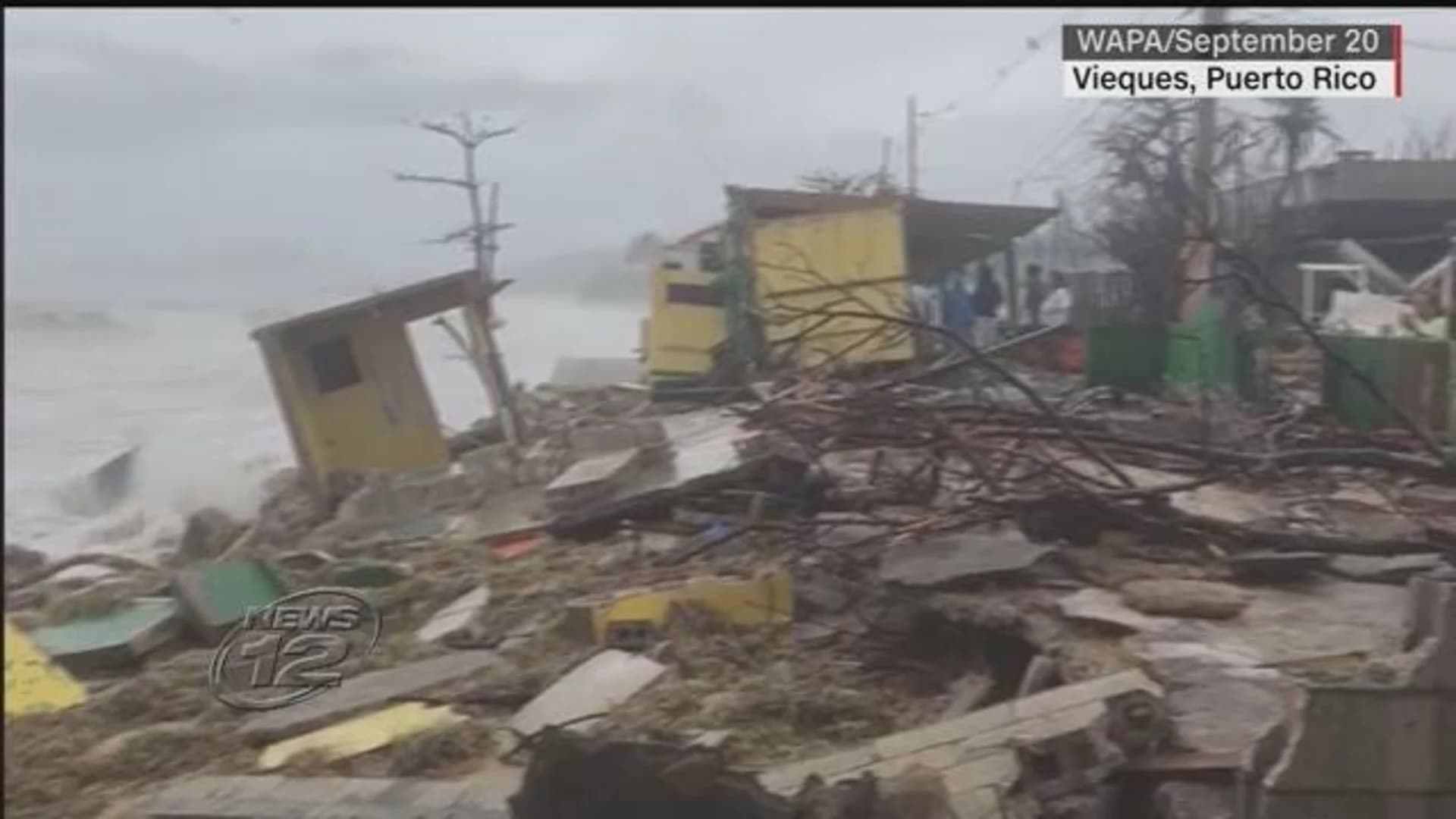 Puerto Rico marks 1 year since Maria with song and sadness