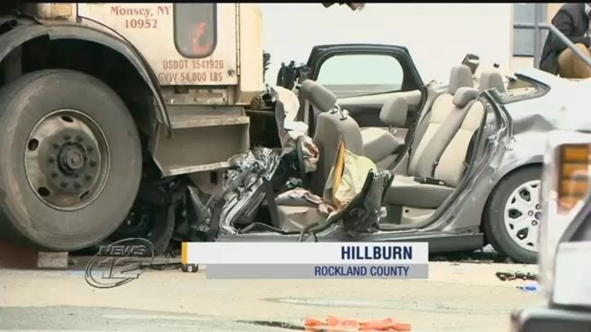 Driver seriously injured when garbage truck crushes car