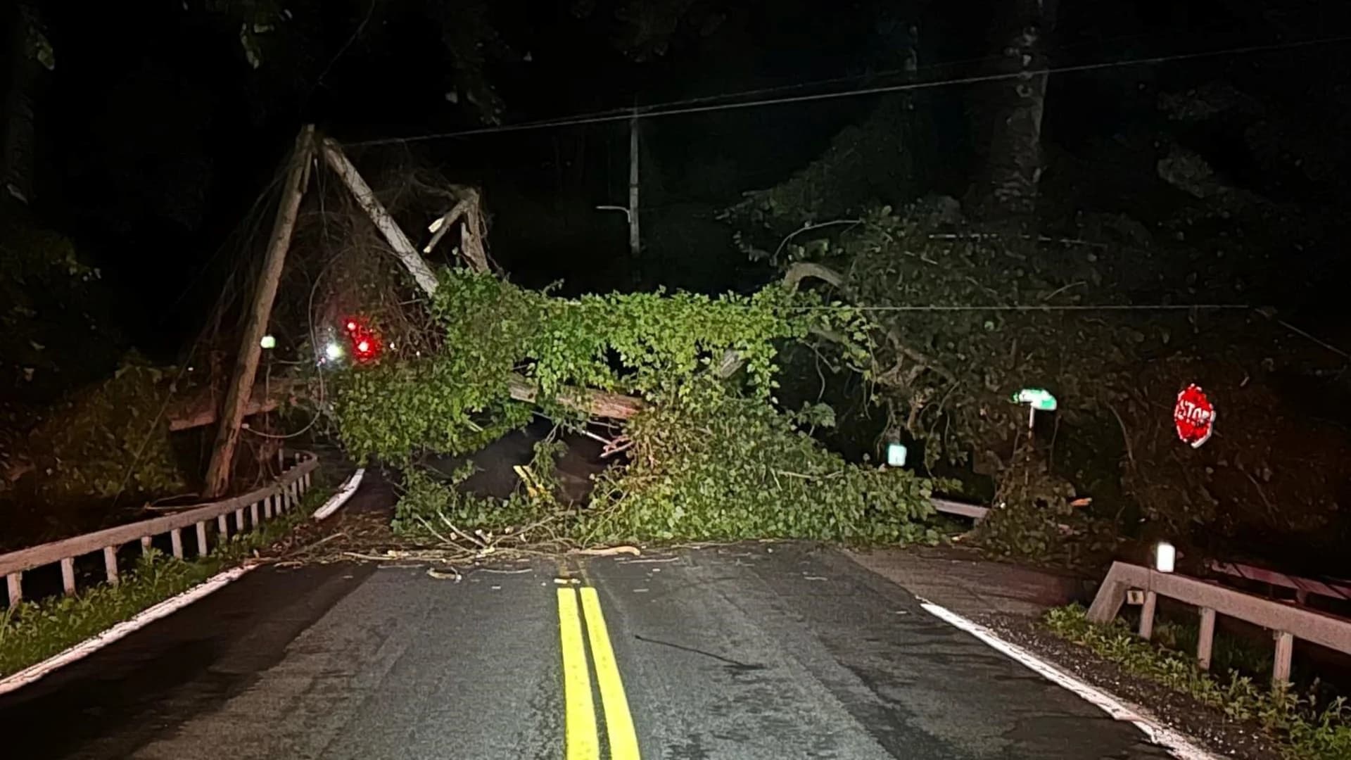 Fallen tree and broken utility poles cleared from Croton-on-Hudson road