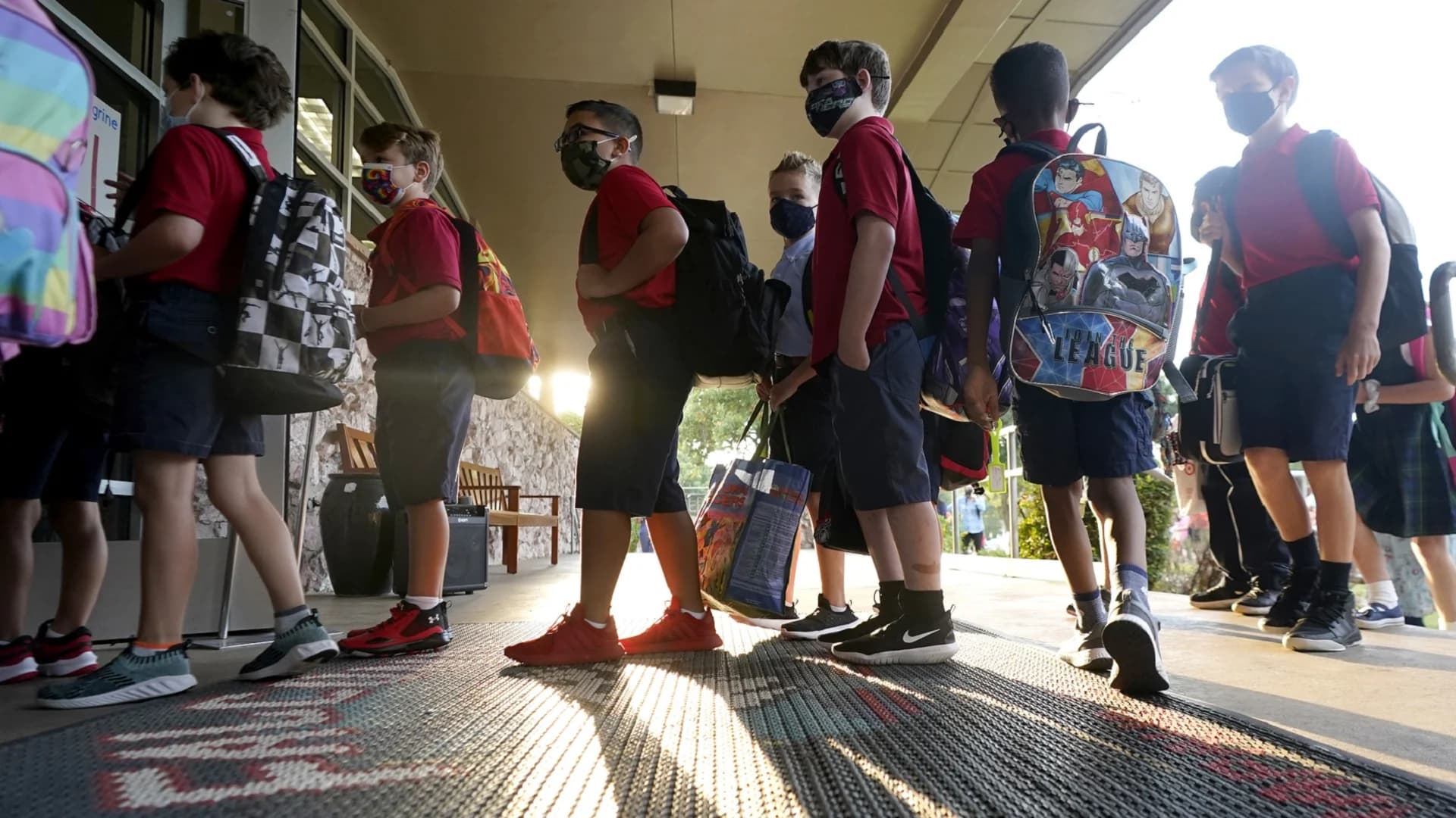 AP-NORC poll: School mask, vaccine mandates supported in US