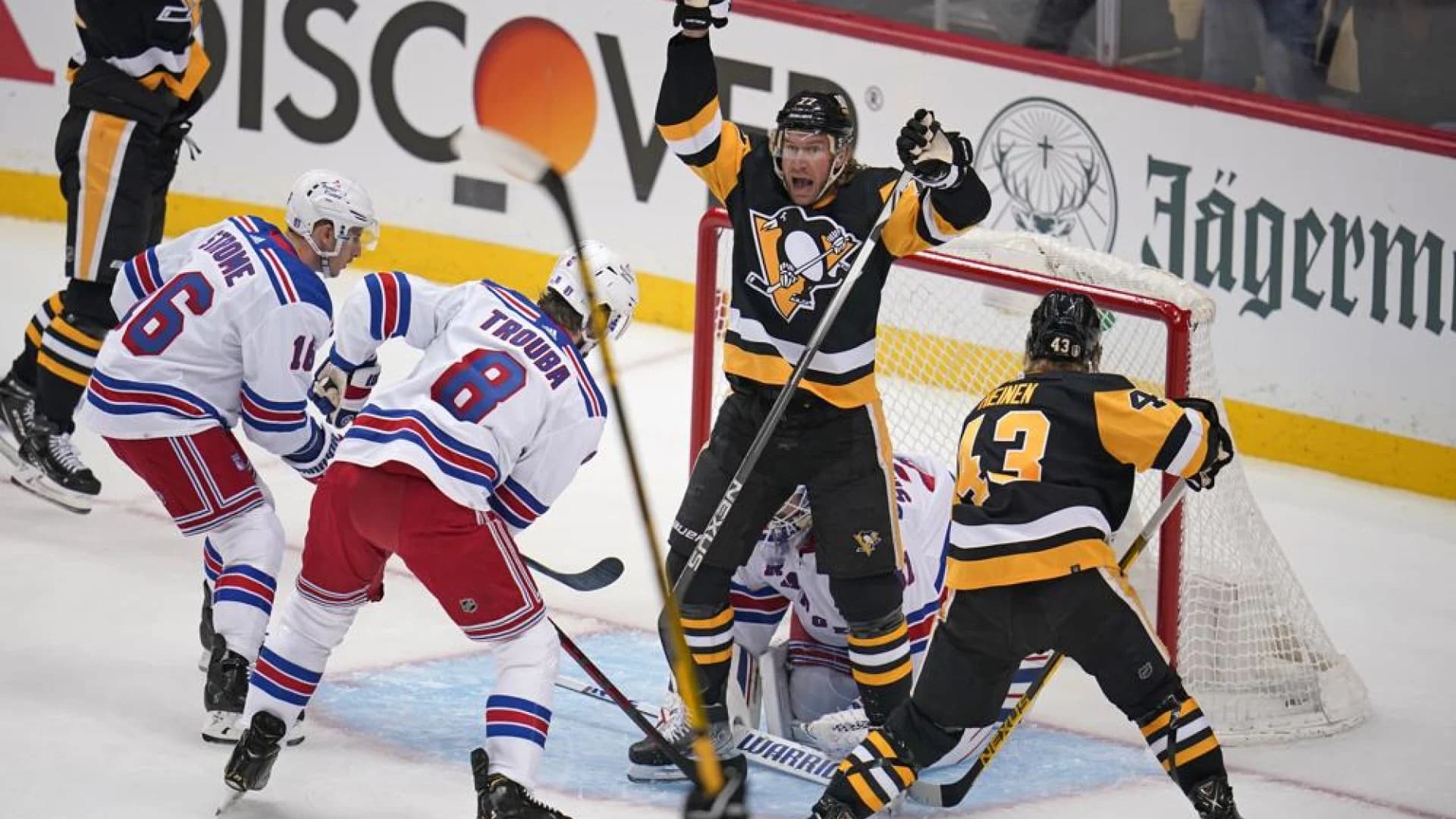 Heinen’s goal ignites late surge, Penguins top Rangers 7-4